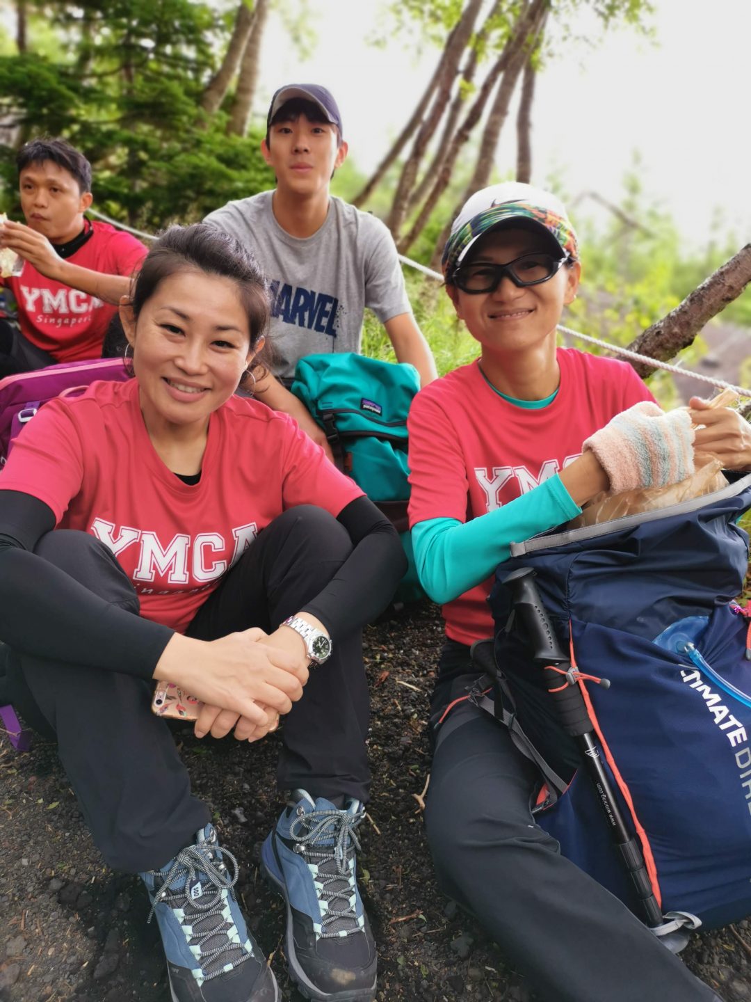 Denise (left) and Chris (right), who has tunnel vision, were paired up to ascend the mountain together.